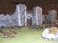 Forteresse (vue de face : breteche, 2 ramparts et tour d'angle, attaque des Uruk-Hais.) Forteresse (vue de face : breteche, 2 remparts et tour d'angle, attaque des Uruk-Hais).